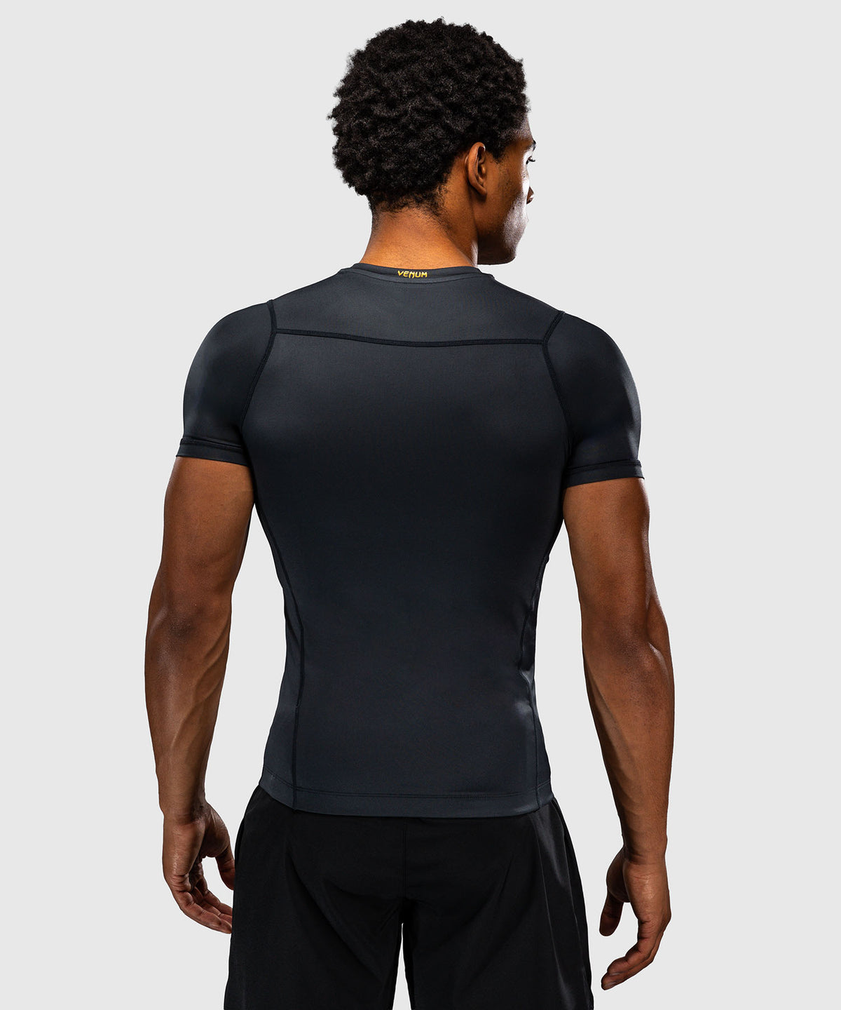 Venum Attack Rashguard a maniche corte - Nero/Oro