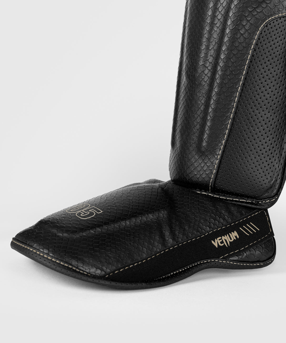 Venum Impact Evo Scales Espinilleras – Negro