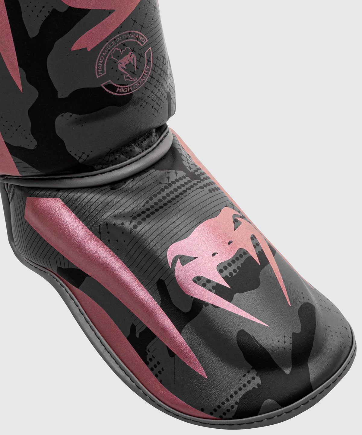 Espinillera Venum Elite - Negra/Rosa/Oro