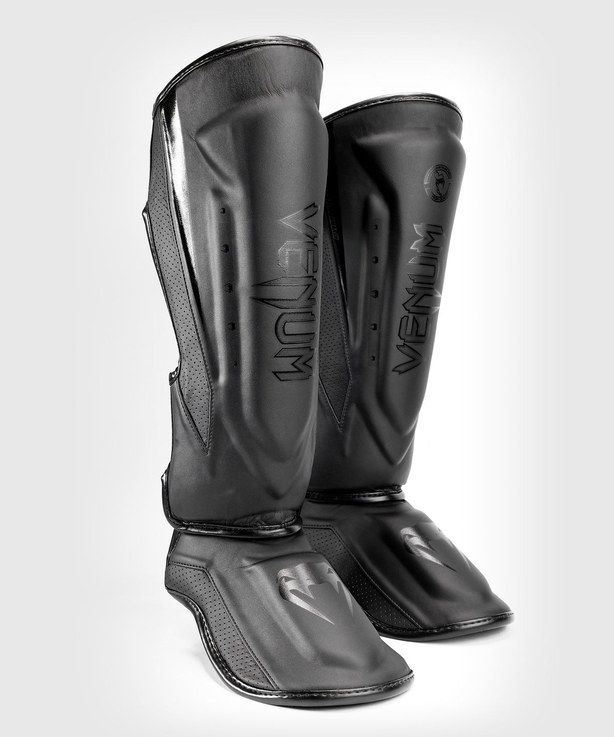 Venum Elite Evo Schienbeinschoner - Schwarz/Schwarz