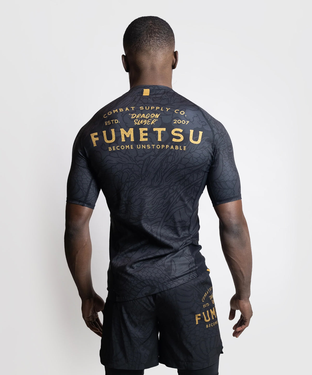 Fumetsu Dragon Slayer Kurzarm-Rashguard - Schwarz/Gold