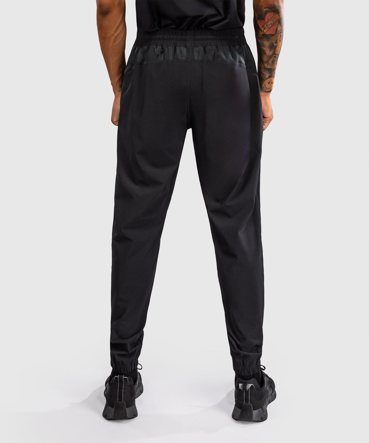 Venum G-Fit Revolution Pantalón de chándal - Negro/Cobre