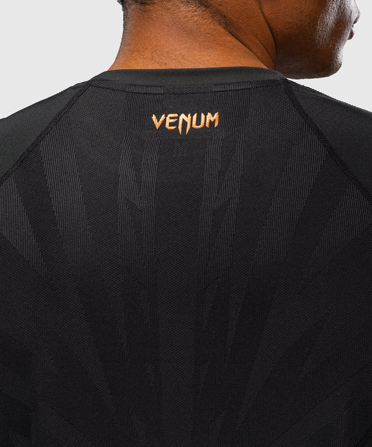 Venum G-Fit Revolution Camiseta Dry Tech - Negro/Cobre