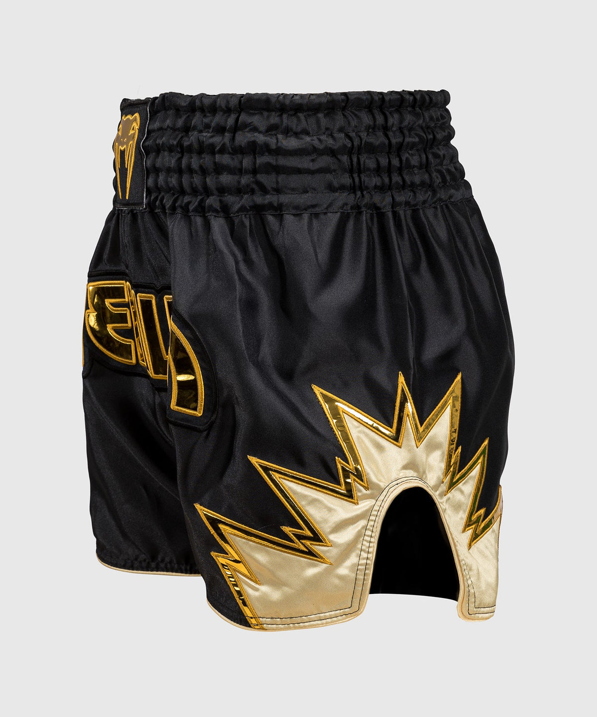 Venum Inferno Pantalones cortos de Muay Thai - Negro/Oro