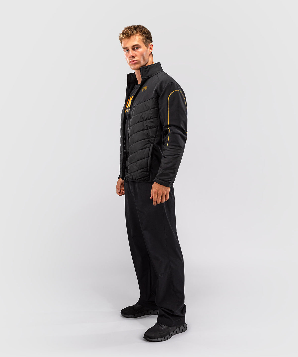 Venum Paddock Softshelljacke - Schwarz/Gold