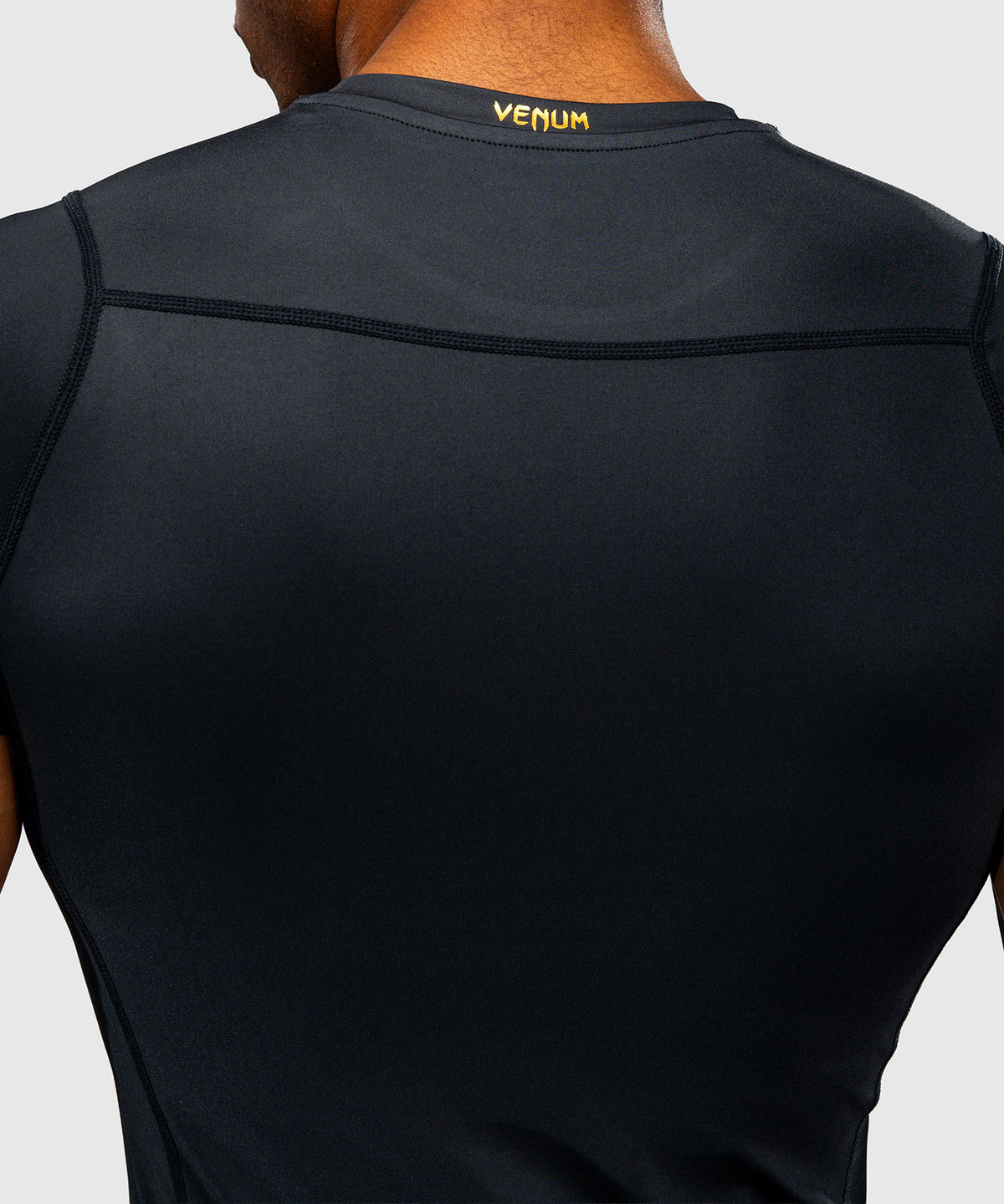 Venum Attack Rashguard a maniche corte - Nero/Oro