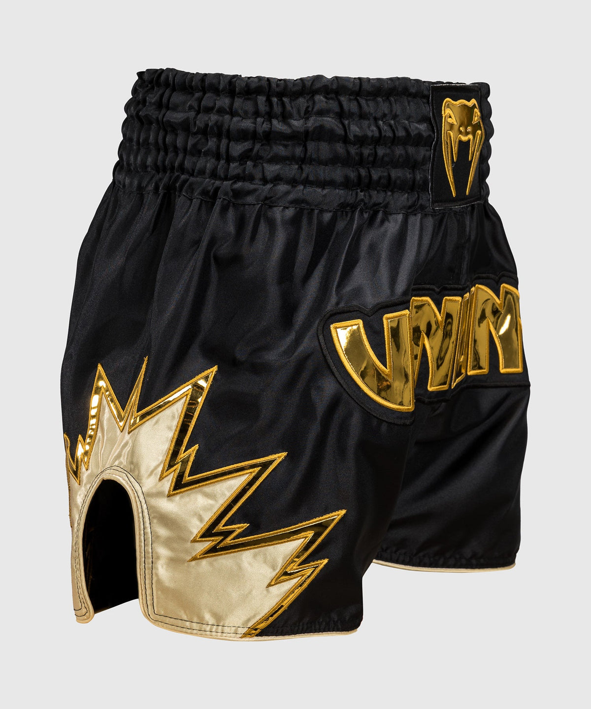 Venum Inferno Pantalones cortos de Muay Thai - Negro/Oro