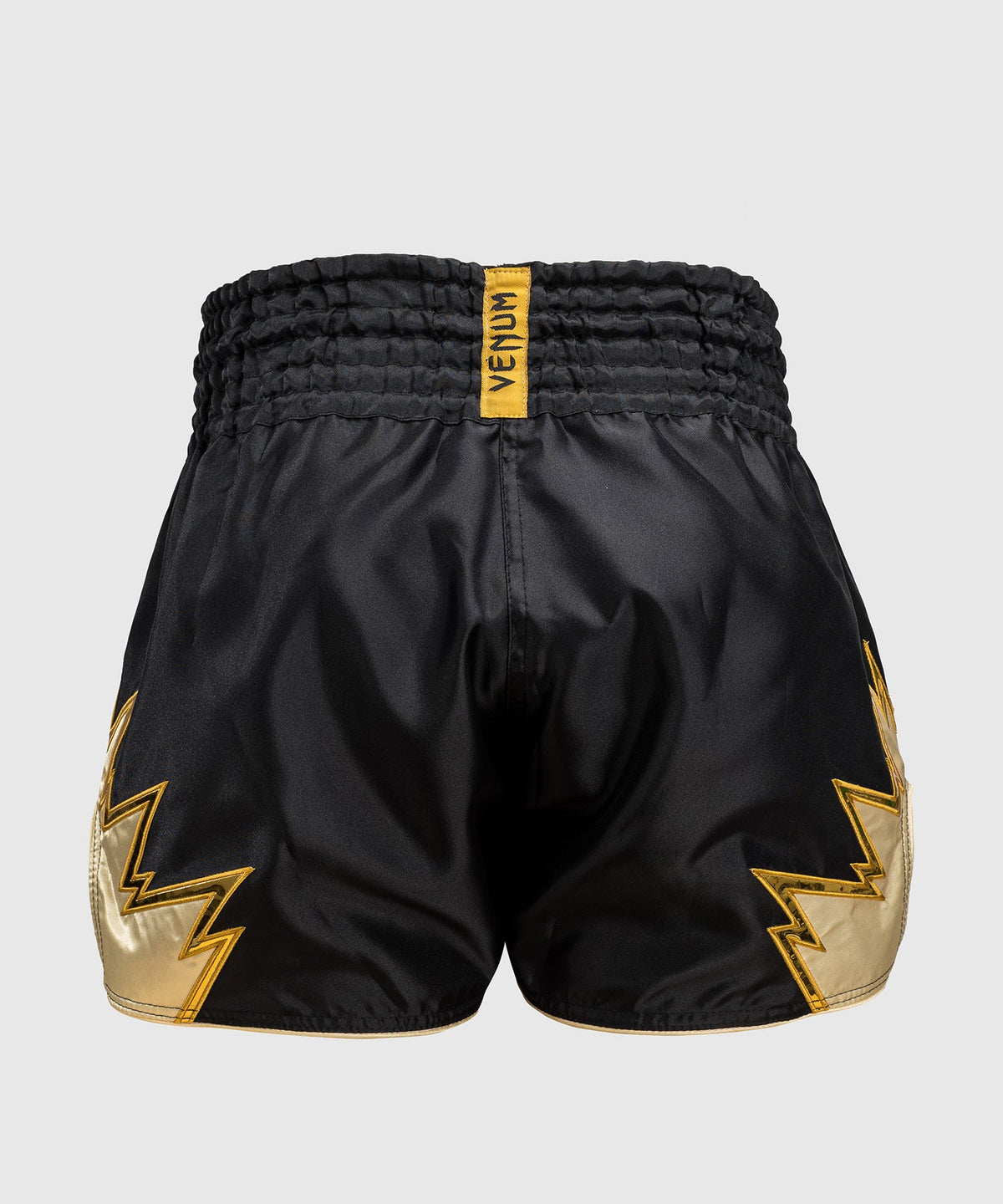 Venum Inferno Pantalones cortos de Muay Thai - Negro/Oro