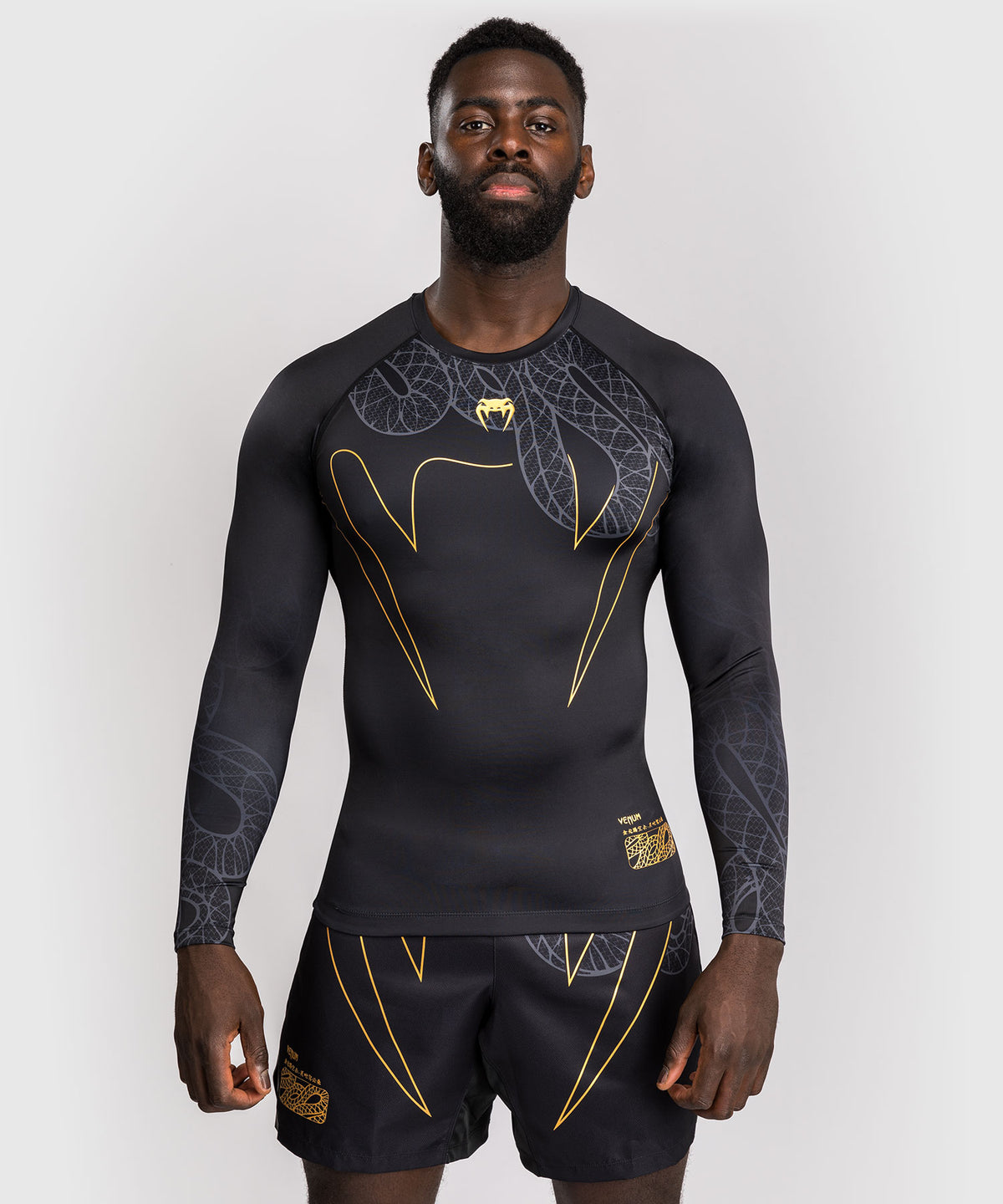 Venum Serpenti Langarm Rashguard – Schwarz/Silber/Gold