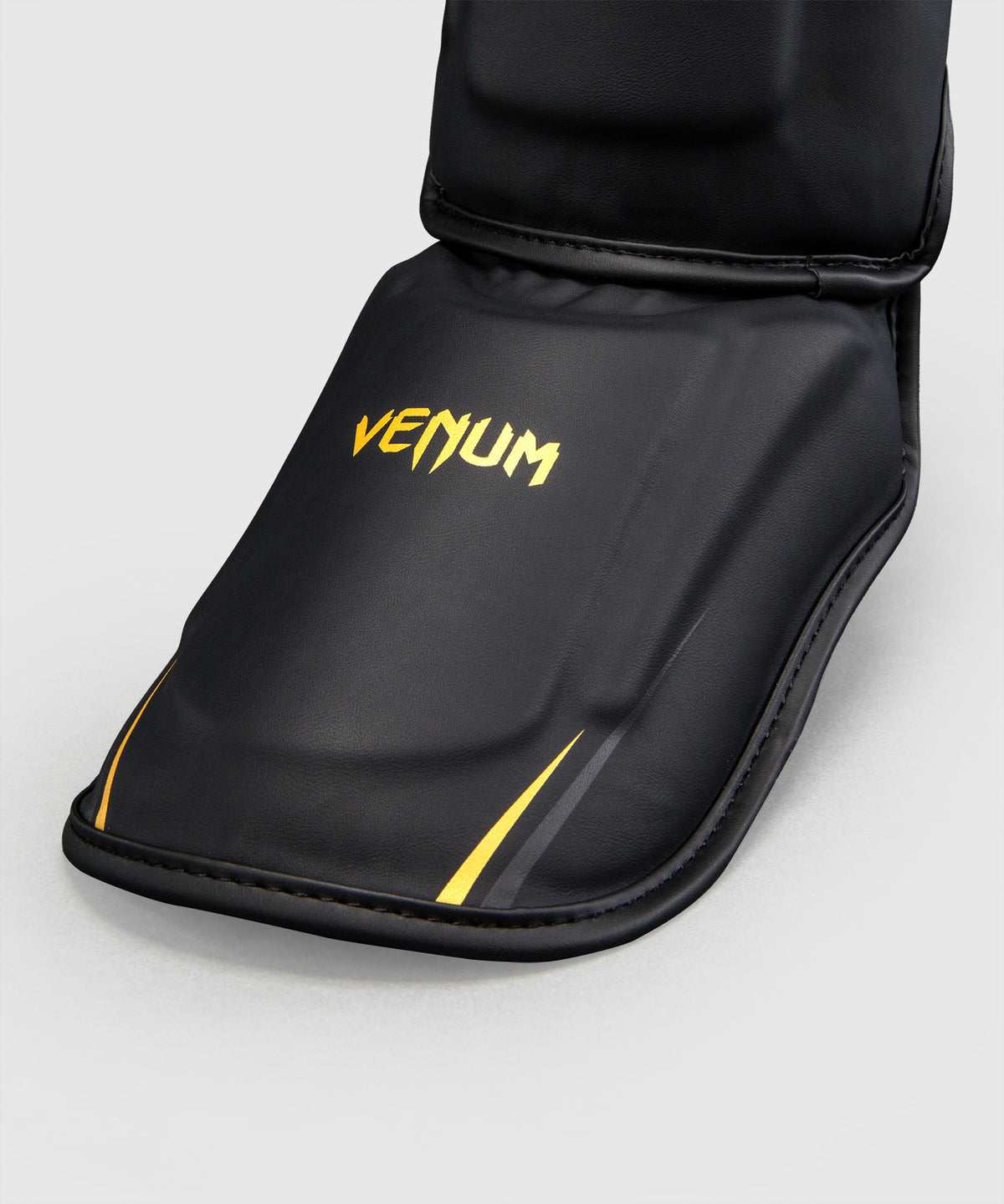 Venum G-Core Shin Guards - Black/Gold