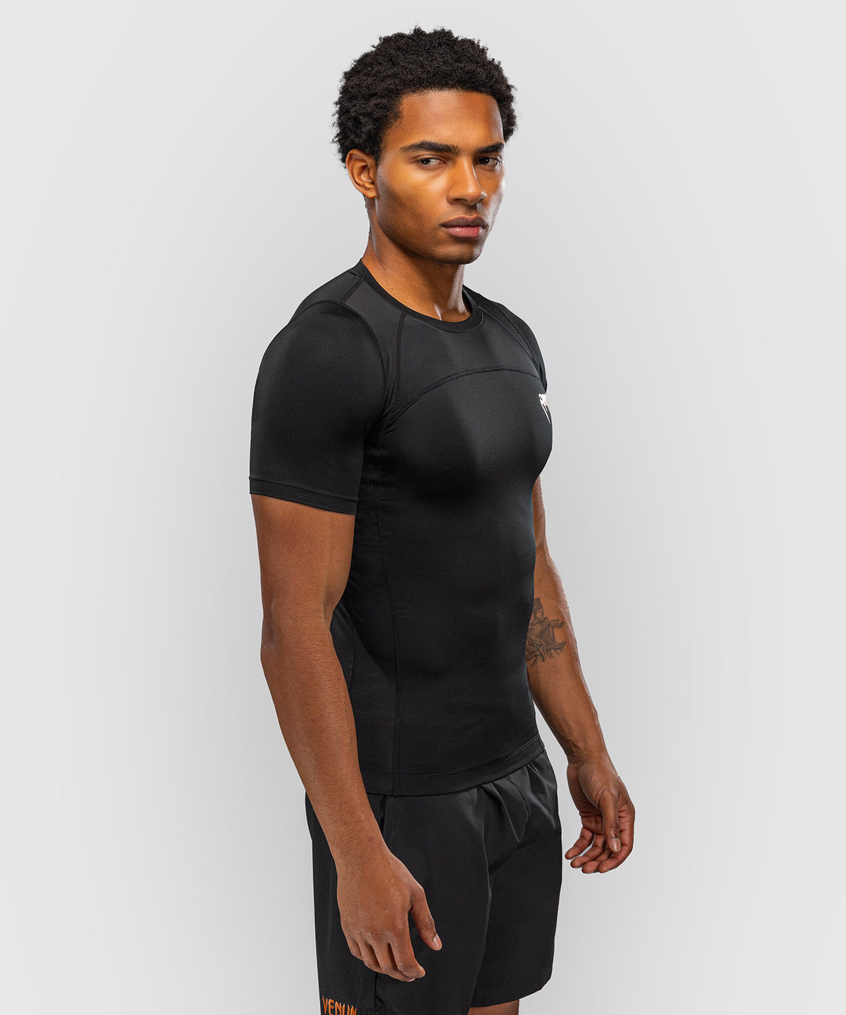 Venum G-Fit Revolution Rashguard de manga corta - Negro/Cobre