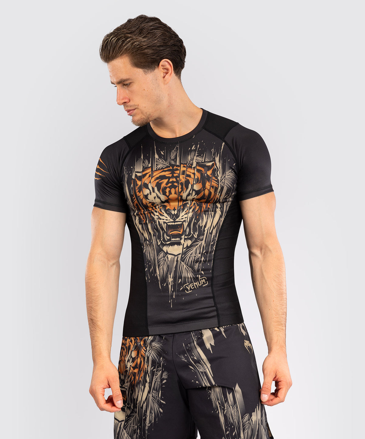 Rashguard à Manches Courtes Venum Tiger pour Hommes - Noir/Orange Néon