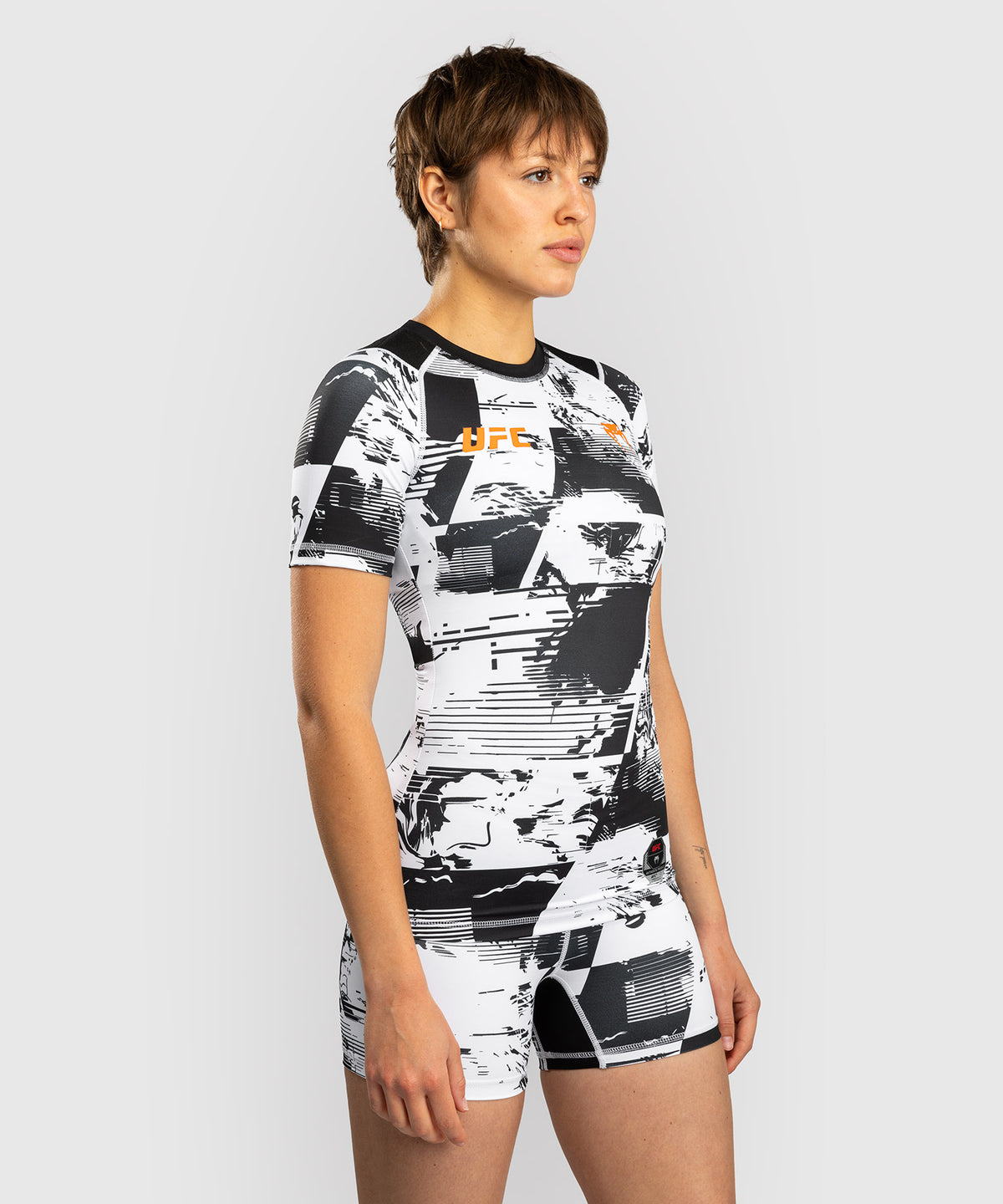 Women’s UFC Zenith by Venum White Authentic Fight Week Performance Short Sleeve Rashguard