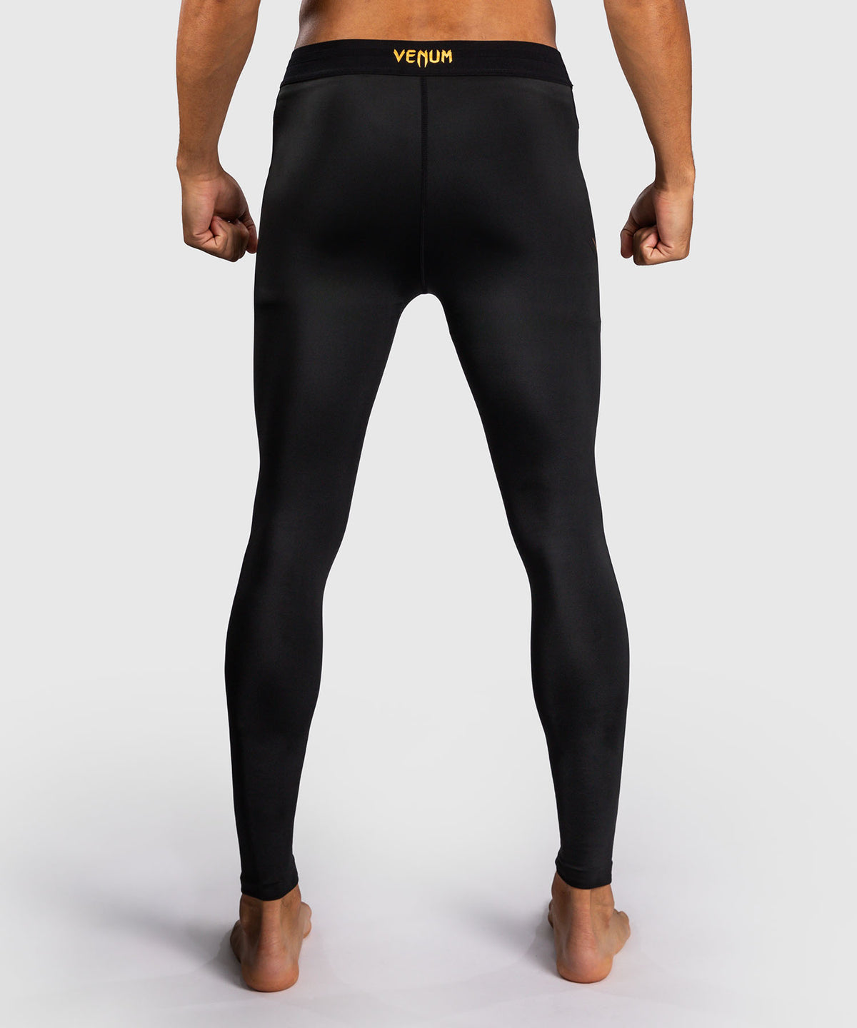 Venum G-Core Spats - Negro/Oro