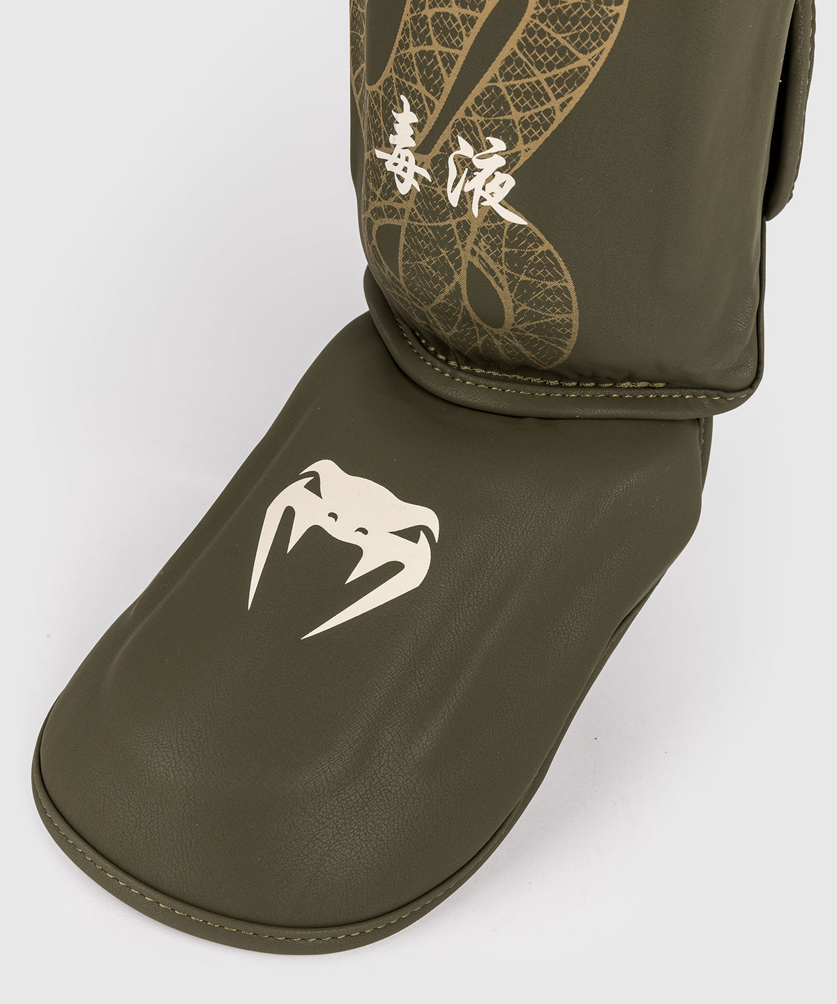 Venum Serpenti Paratibie – Kaki/Bronzo/Avorio