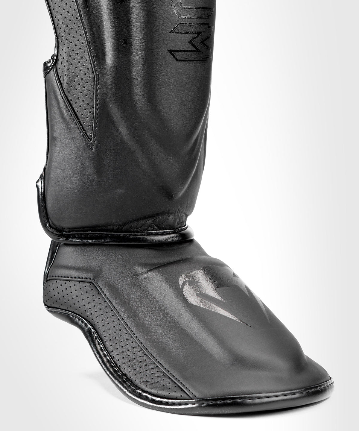 Venum Elite Evo Schienbeinschoner - Schwarz/Schwarz