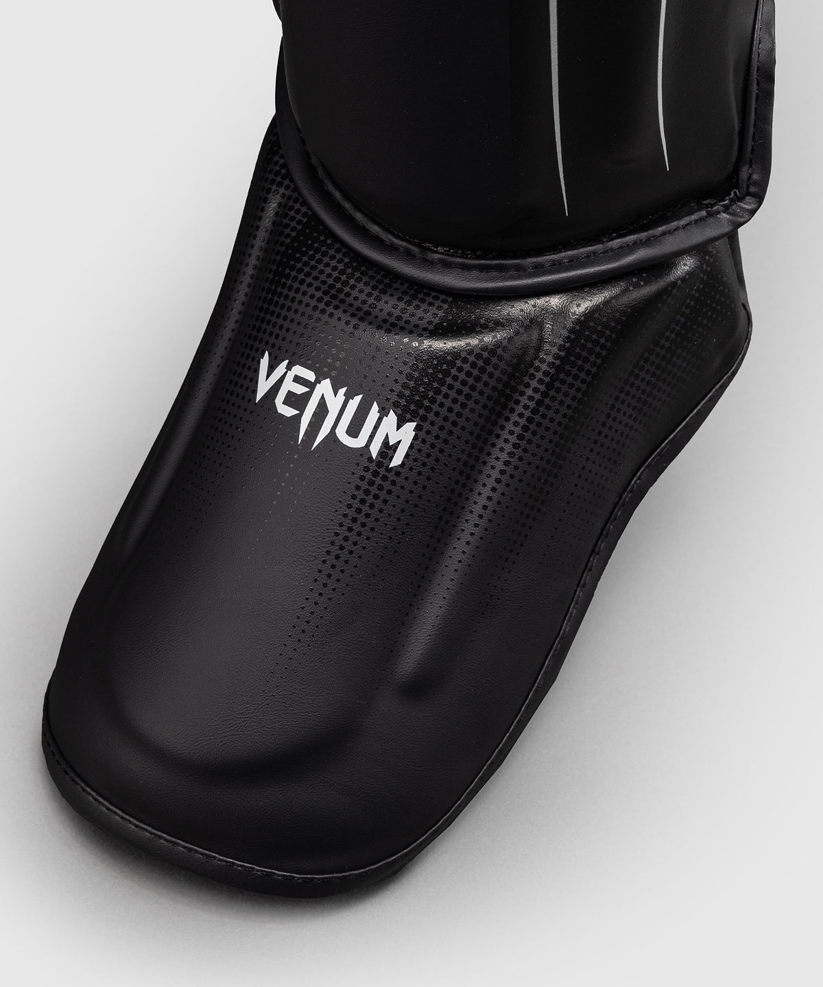 Protège-tibias Venum Stealth – Noir/Blanc