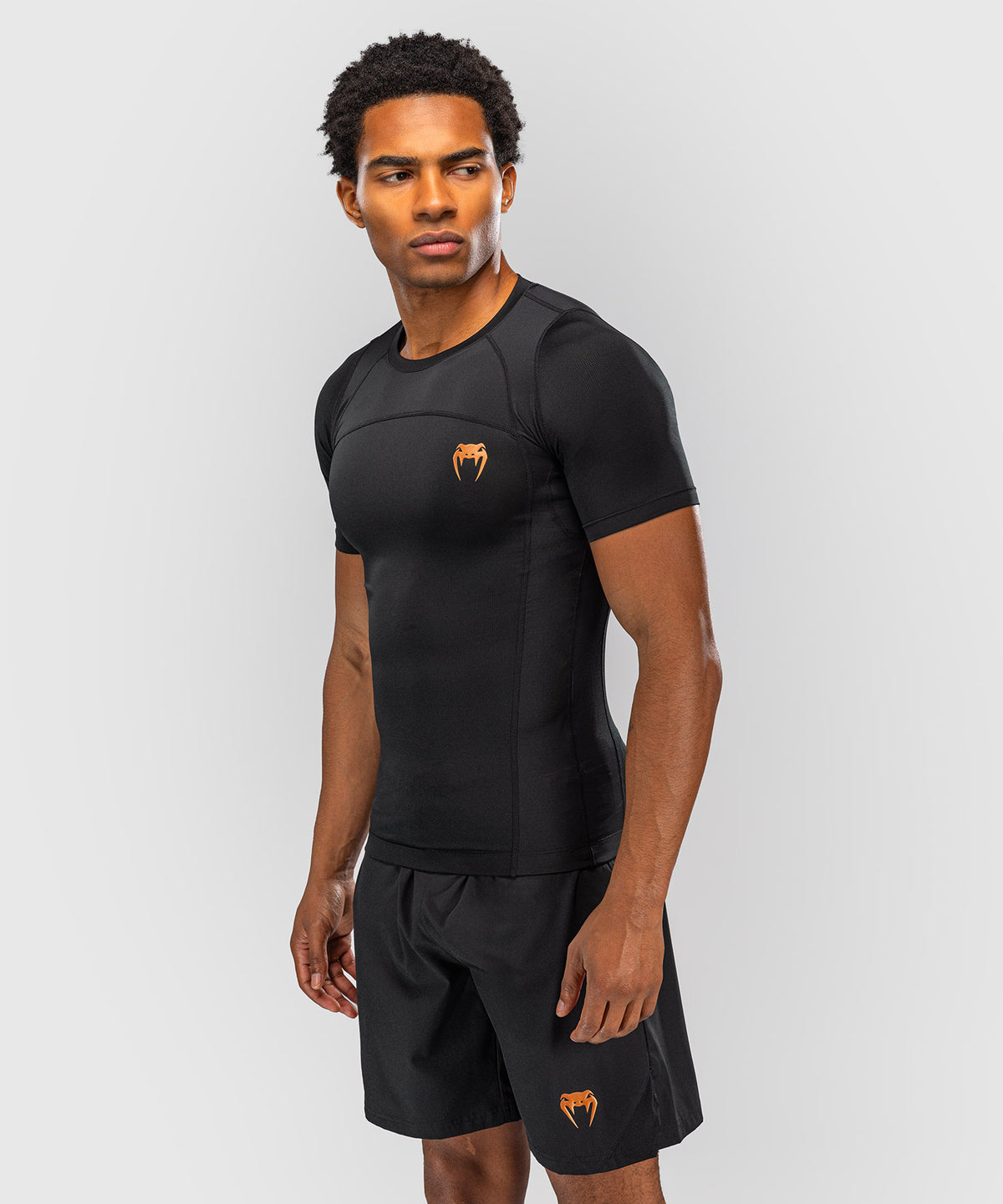 Venum G-Fit Revolution Rashguard de manga corta - Negro/Cobre
