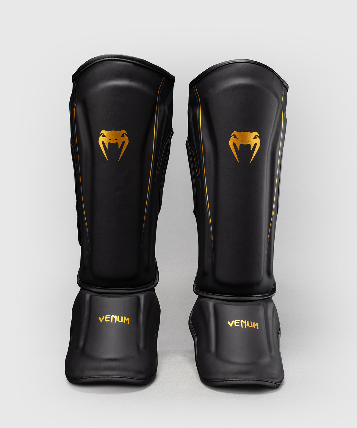 Venum Streamline Schienbeinschoner – Schwarz/Gold