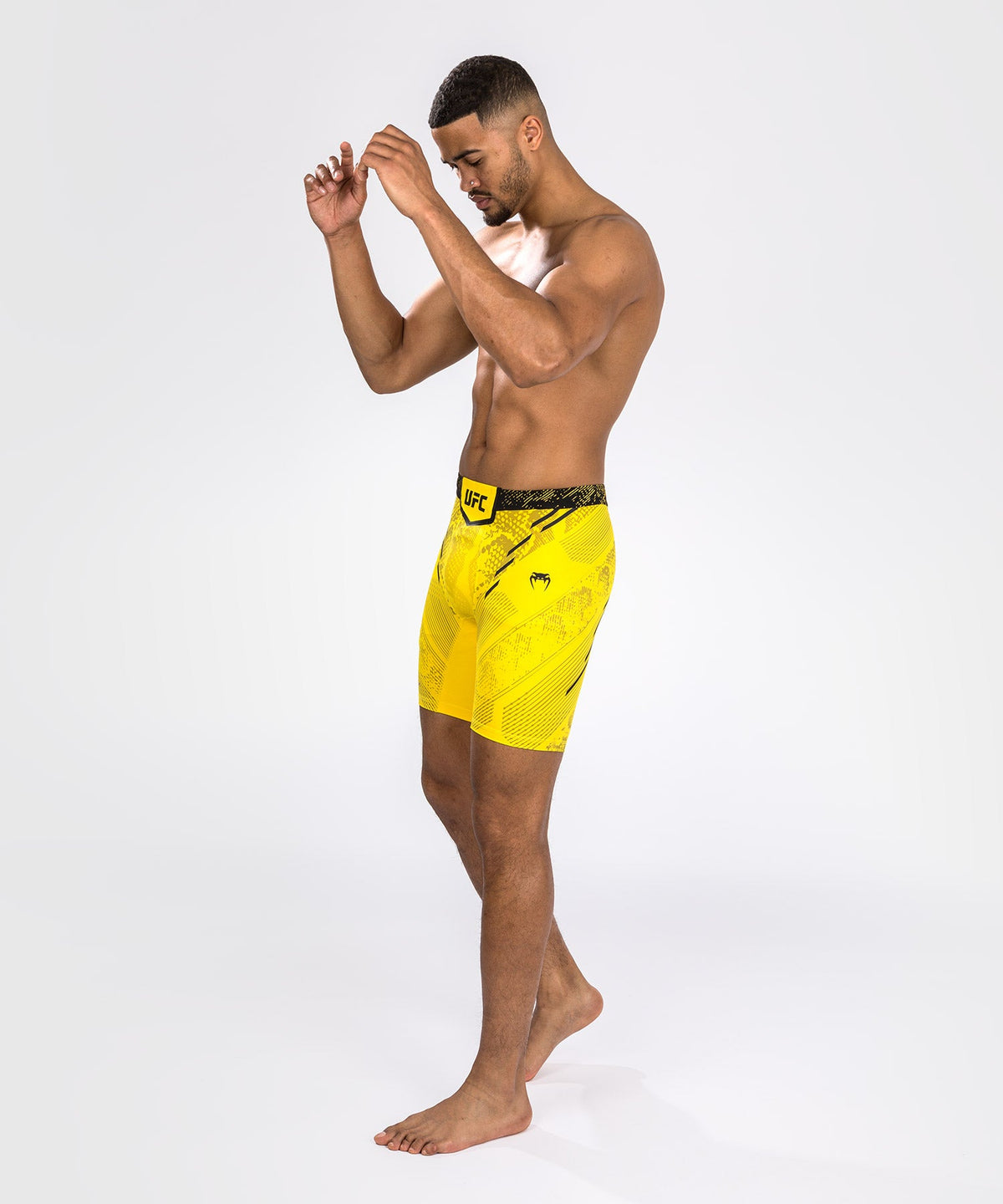 UFC Adrenaline by Venum Authentic Fight Night Herren Kompressionsshorts - Gelb