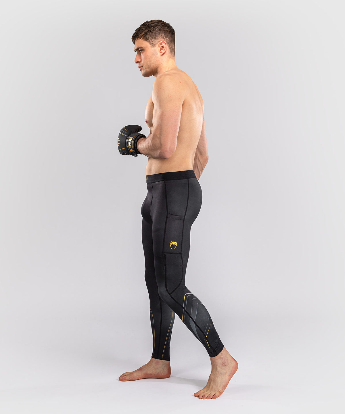 Venum Streamline Spats – Schwarz/Gold