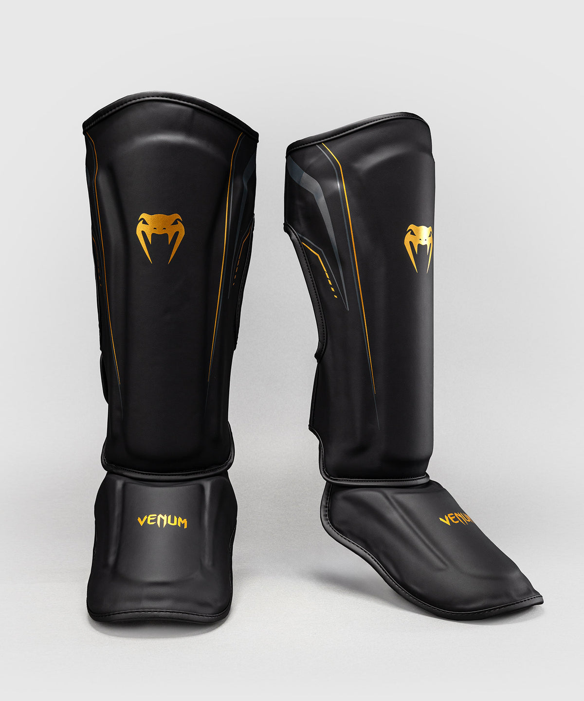 Venum Streamline Schienbeinschoner – Schwarz/Gold