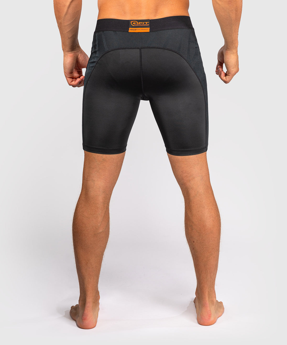 Venum G-Fit Revolution Vale-Tudo-Shorts - Schwarz/Kupfer