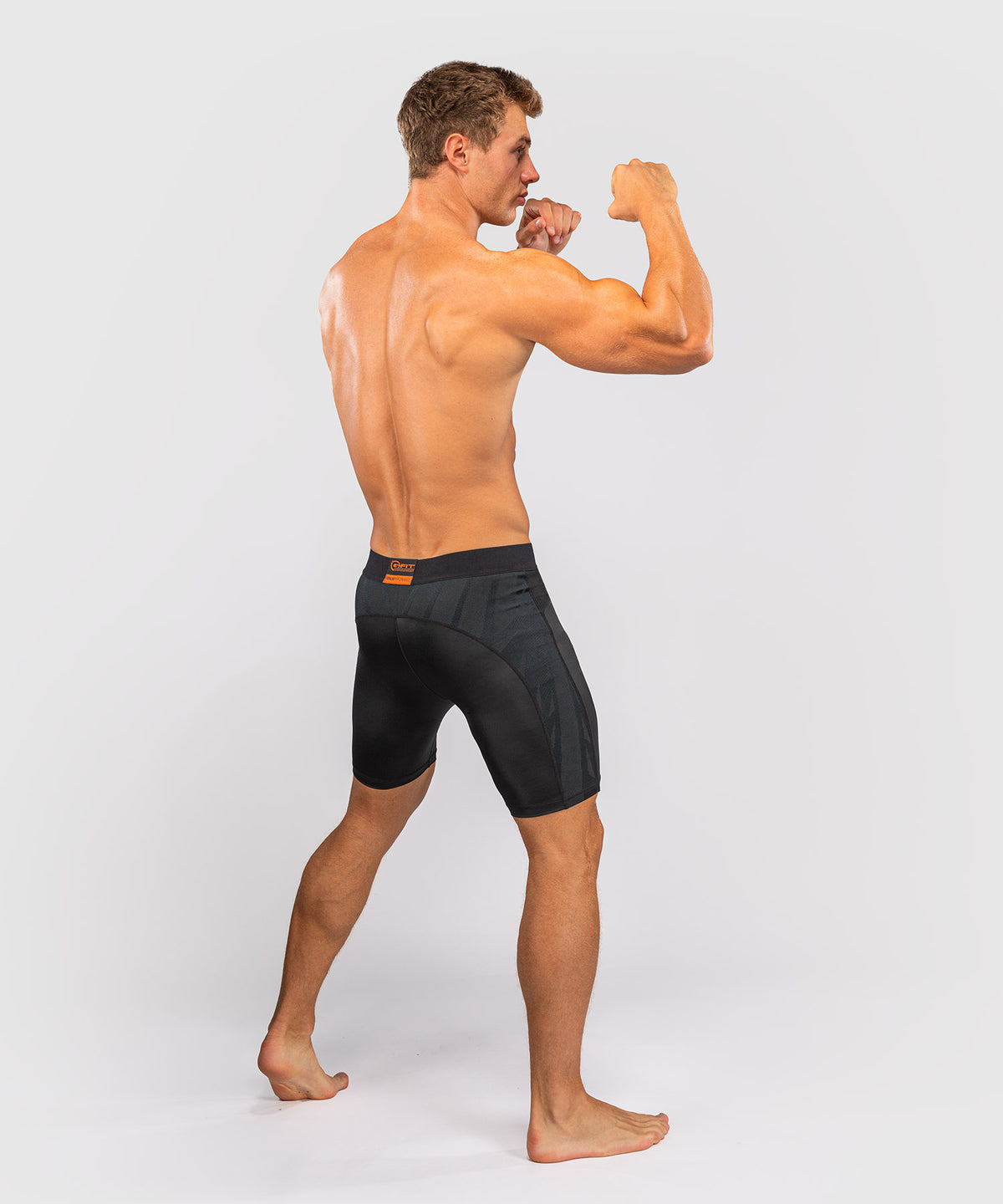 Venum G-Fit Revolution Vale-Tudo-Shorts - Schwarz/Kupfer